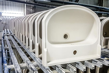 Pressure casting of wash basins